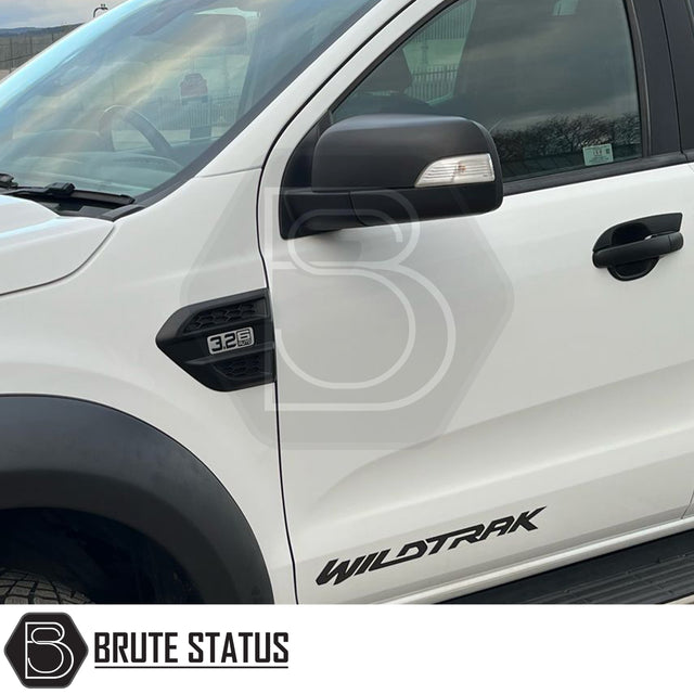 Pair of matte black ABS plastic door mirror covers for 2012–2022 Ford Ranger models with indicator mirrors, featuring pre-applied 3M adhesive for easy, tool-free installation