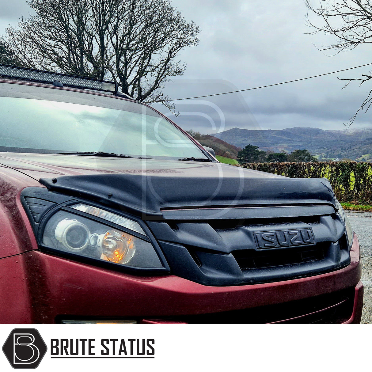 Isuzu D-Max 2013-2016 Bonnet Guard Protector & Window Wind Deflectors Bundle on red pickup, showcasing sleek design and protective features on a country road.