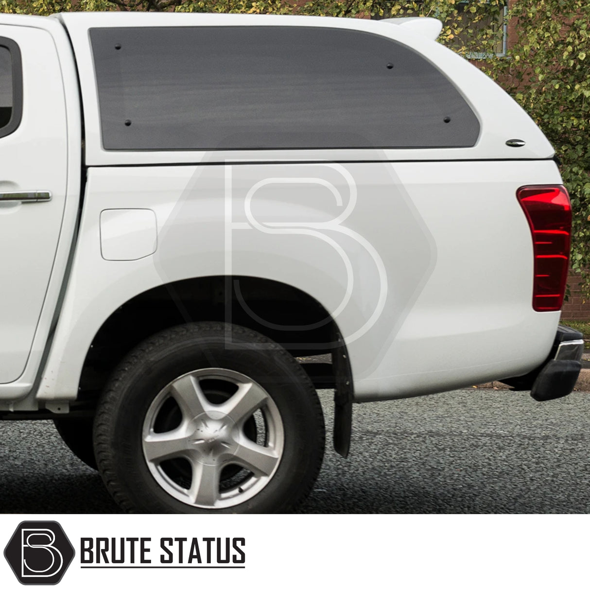 Isuzu D-Max 2012-2021 Truckman Grand Hardtop Canopy with remote locking; features matching white camper shell, tinted windows, and stylish Brute Status logo.