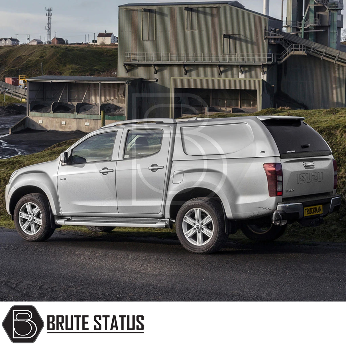 Isuzu D-Max 2012-2021 Truckman L-Series Hardtop Canopy with remote locking, solid sides, parked by an industrial building, showcasing enhanced security and seamless design.
