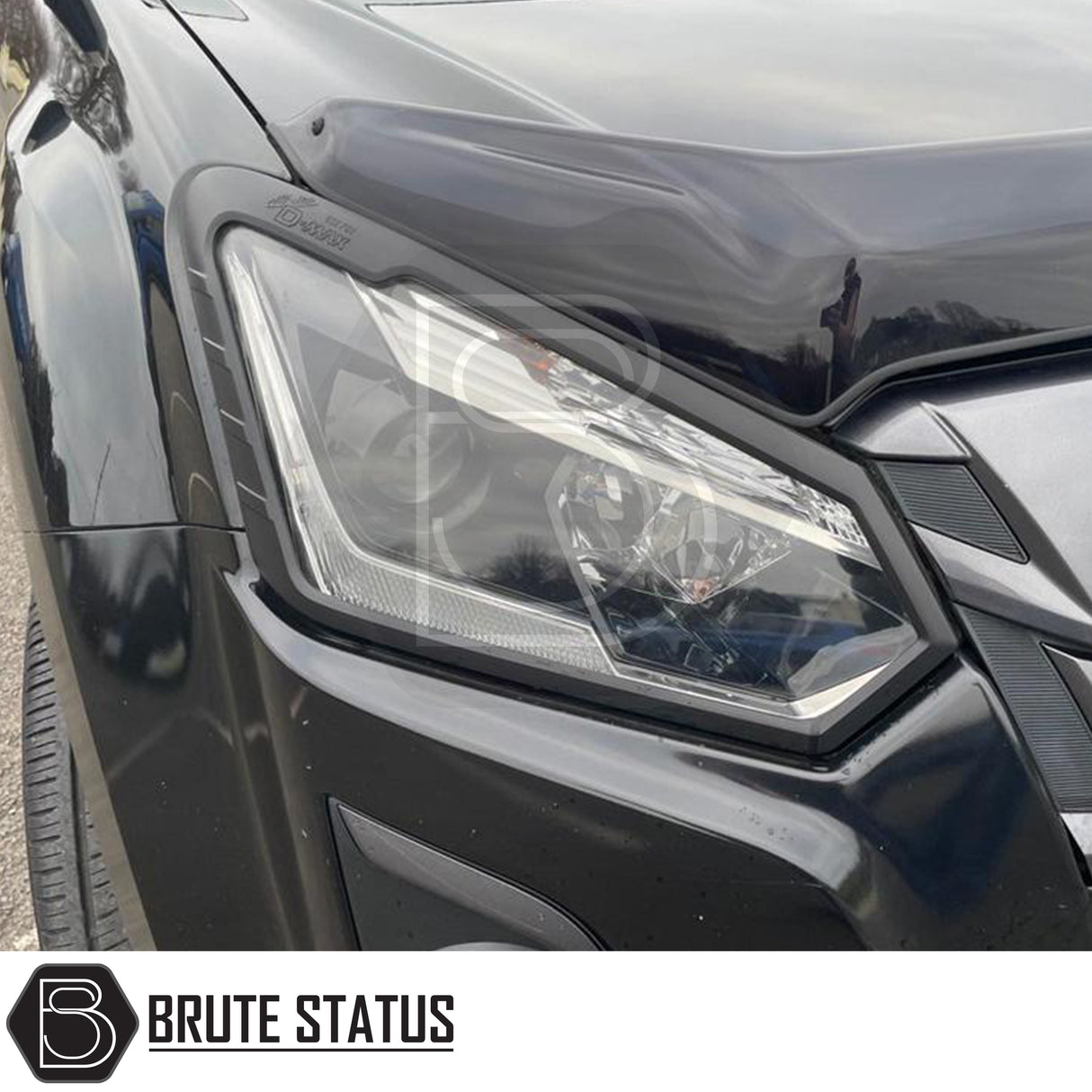 Head Light Covers for Isuzu D-Max 2016-2019, enhancing truck aesthetics with a bold design, crafted from durable ABS plastic for easy installation and lasting style.