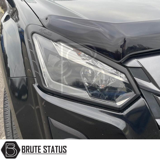 Head Light Covers for Isuzu D-Max 2016-2019, enhancing truck aesthetics with a bold design, crafted from durable ABS plastic for easy installation and lasting style.