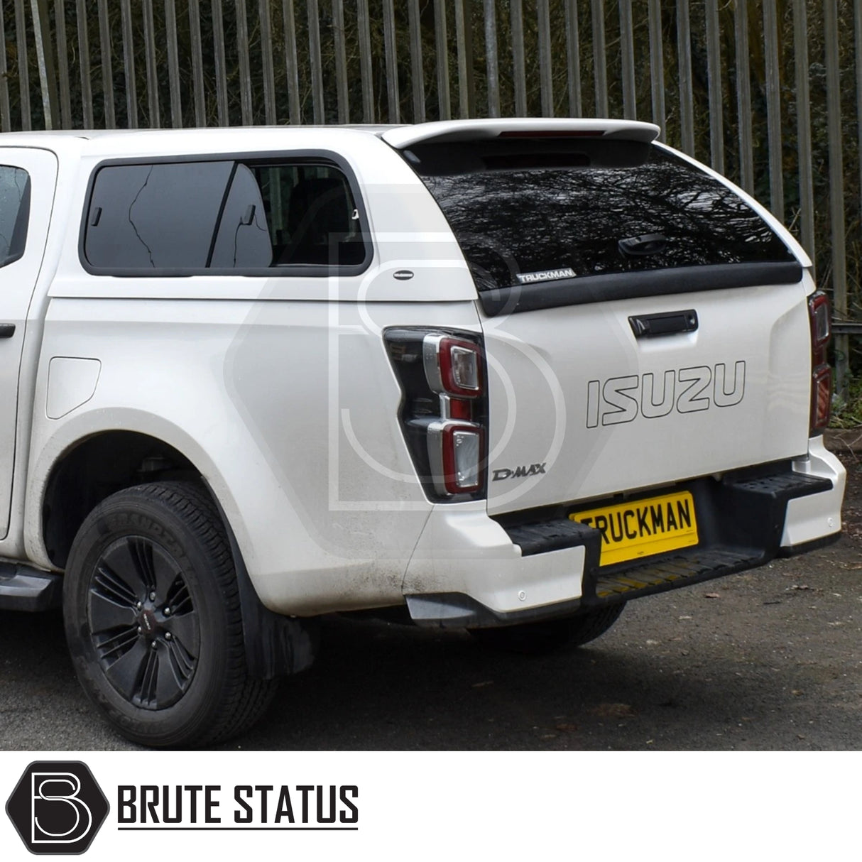 Isuzu D-Max pickup with Truckman GLS Hardtop Canopy, featuring remote locking, roof bars, and tinted windows for enhanced security and ventilation.