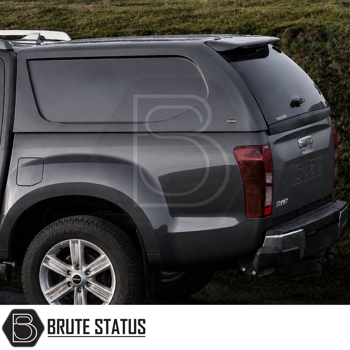Truckman L-Series canopy fitted to Isuzu D-Max pickup truck with solid side panels and LED interior light