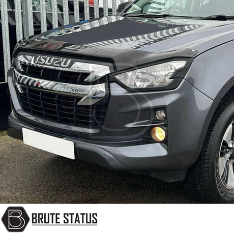 Isuzu D-Max 2021+ Headlight Covers in matt black, showcasing a sleek design for enhanced front-end aesthetics, perfect for a distinctive truck upgrade.