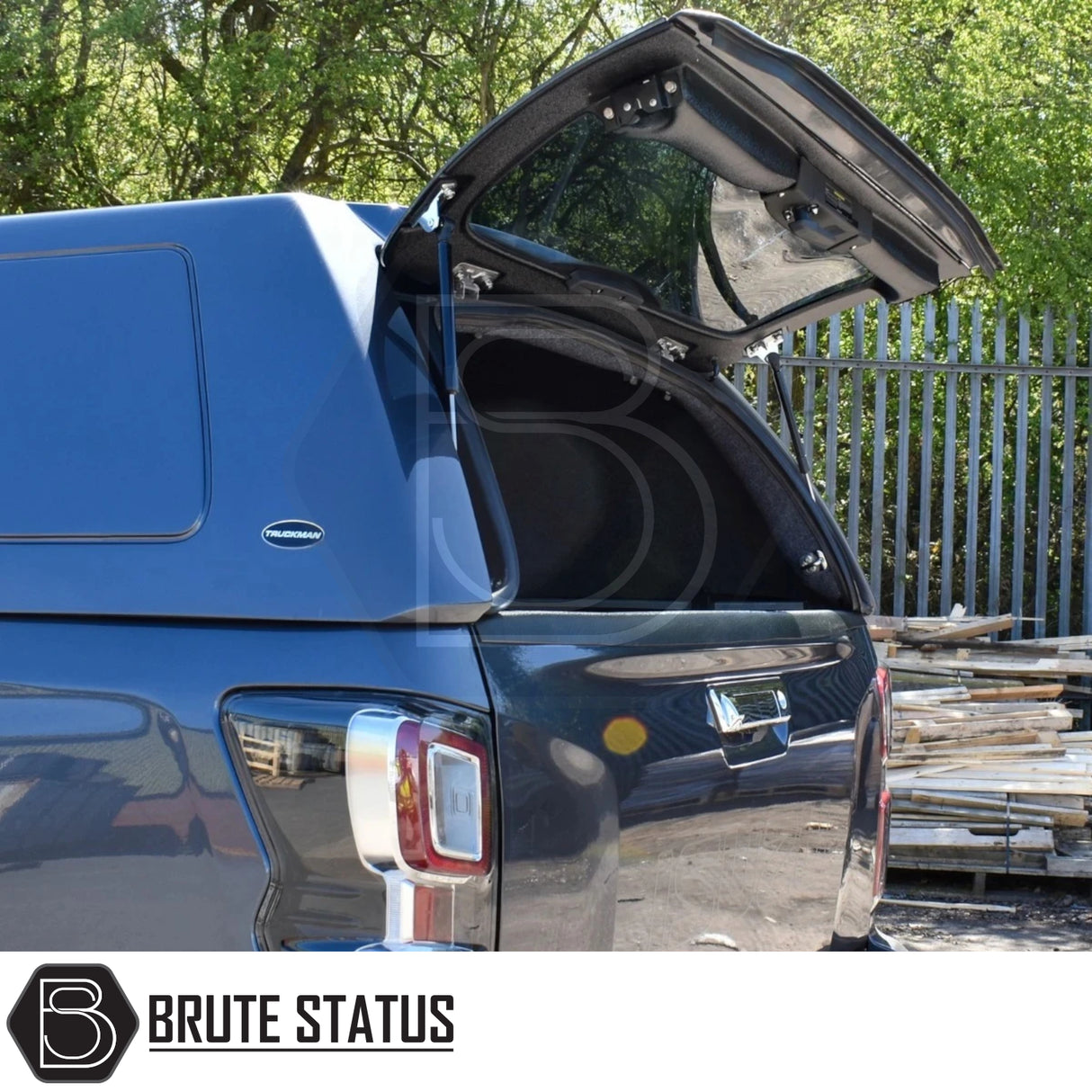 Isuzu D-Max 2025+ Truckman RS Hardtop Canopy with solid rear window, remote locking, shown open on pickup, highlighting secure, versatile design for commercial use.