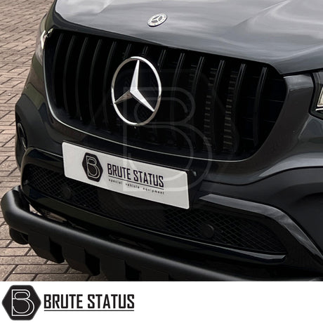 Mercedes X-Class AMG Panamerica Style Front Grille (All Black) installed on a white car, showcasing its sleek design and fitment, ideal for enhancing truck aesthetics.