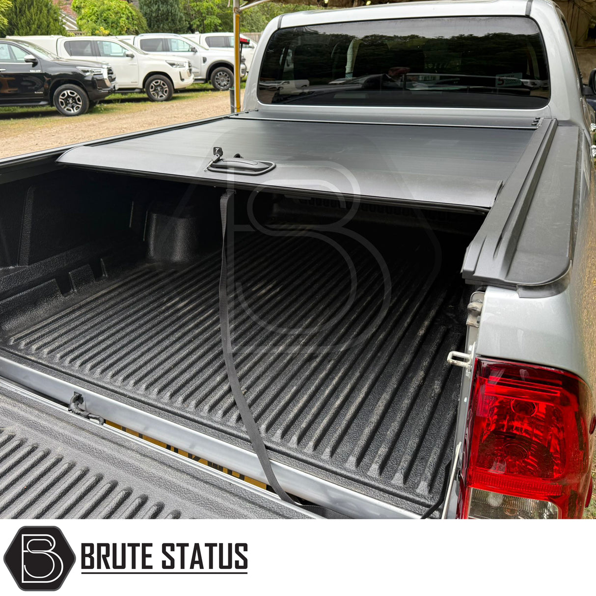 Black manual roller shutter for Ford Ranger  2015-2022 pickup truck. Durable, high-quality design for secure cargo protection and easy manual operation