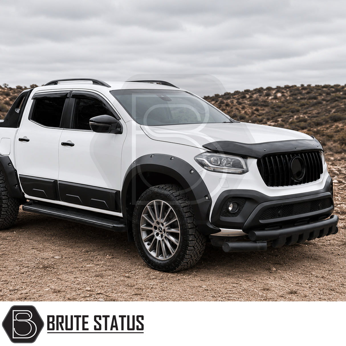 Premium bonnet guard installed on a white Mercedes X-Class with aerodynamic black finish enhancing front-end protection and appearance