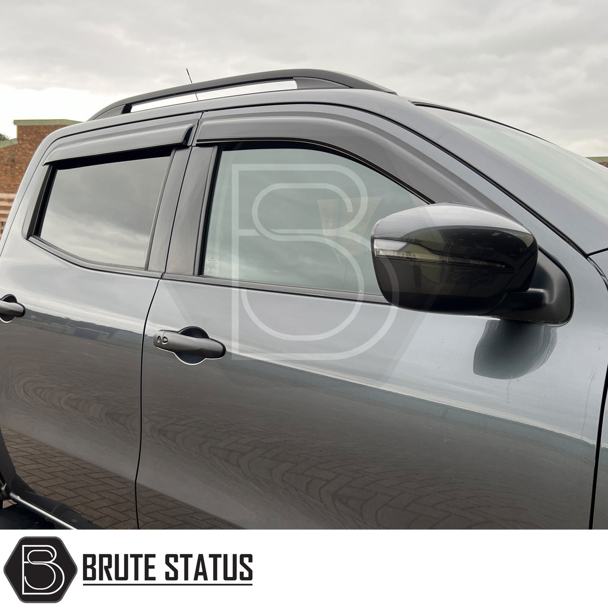 Mercedes X-Class 2017-2020 Bonnet Guard and Wind Deflectors Bundle on a gray pickup, featuring tinted windows, black visors, and roof rack.