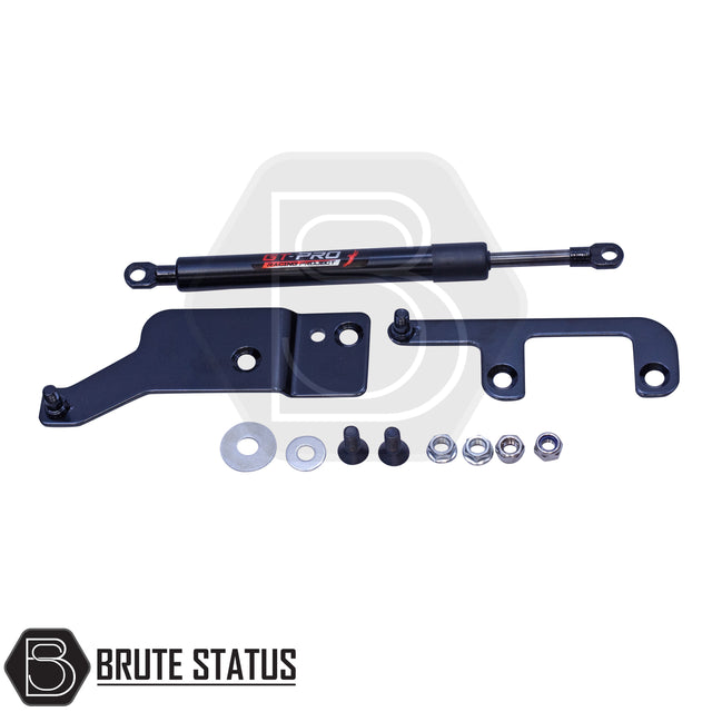 Tailgate damper kit for Mitsubishi L200 featuring a shock absorber for smooth, controlled lowering of the tailgate. Allows one-handed operation and reduces risk of injury or damage. Kit includes hardware, requires one small hole to be drilled, and is designed for easy DIY installation.