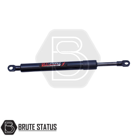 Tailgate damper kit for Mitsubishi L200 featuring a shock absorber for smooth, controlled lowering of the tailgate. Allows one-handed operation and reduces risk of injury or damage. Kit includes hardware, requires one small hole to be drilled, and is designed for easy DIY installation.