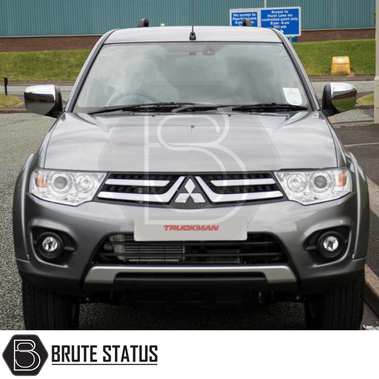 Mitsubishi L200 2010-2015 with Truckman GLS Hardtop Canopy, featuring remote locking and luxury design, parked on pavement, showcasing headlights and grille badge.