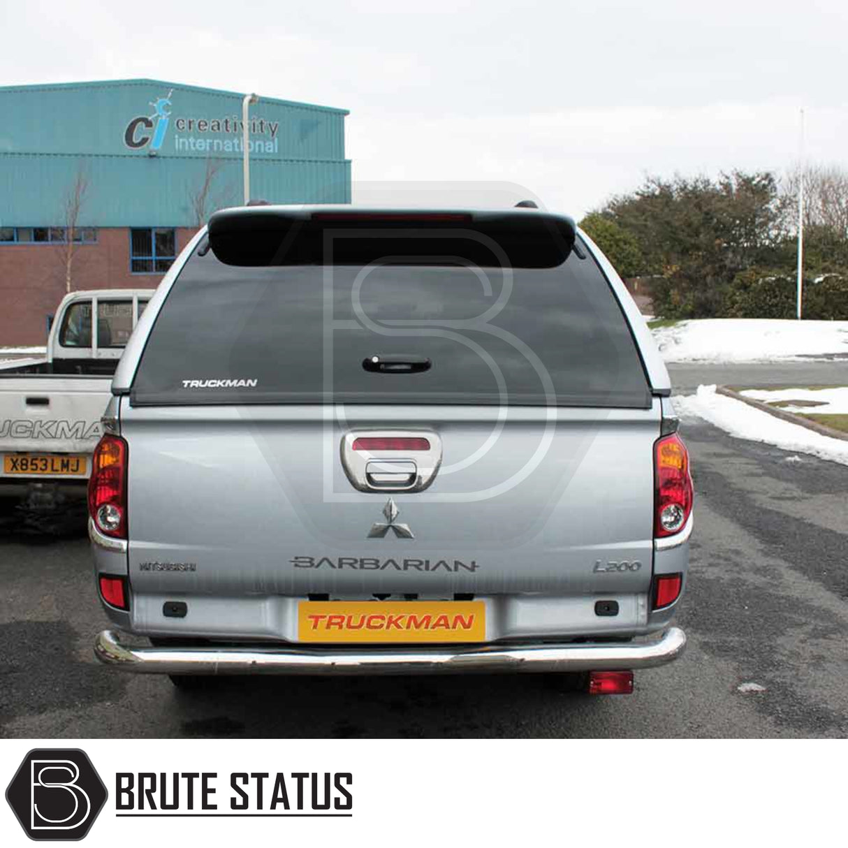 Mitsubishi L200 2010-2015 Truckman Grand Hardtop Canopy with remote locking, featuring pop-out tinted windows and secure cargo access, enhancing pick-up functionality.