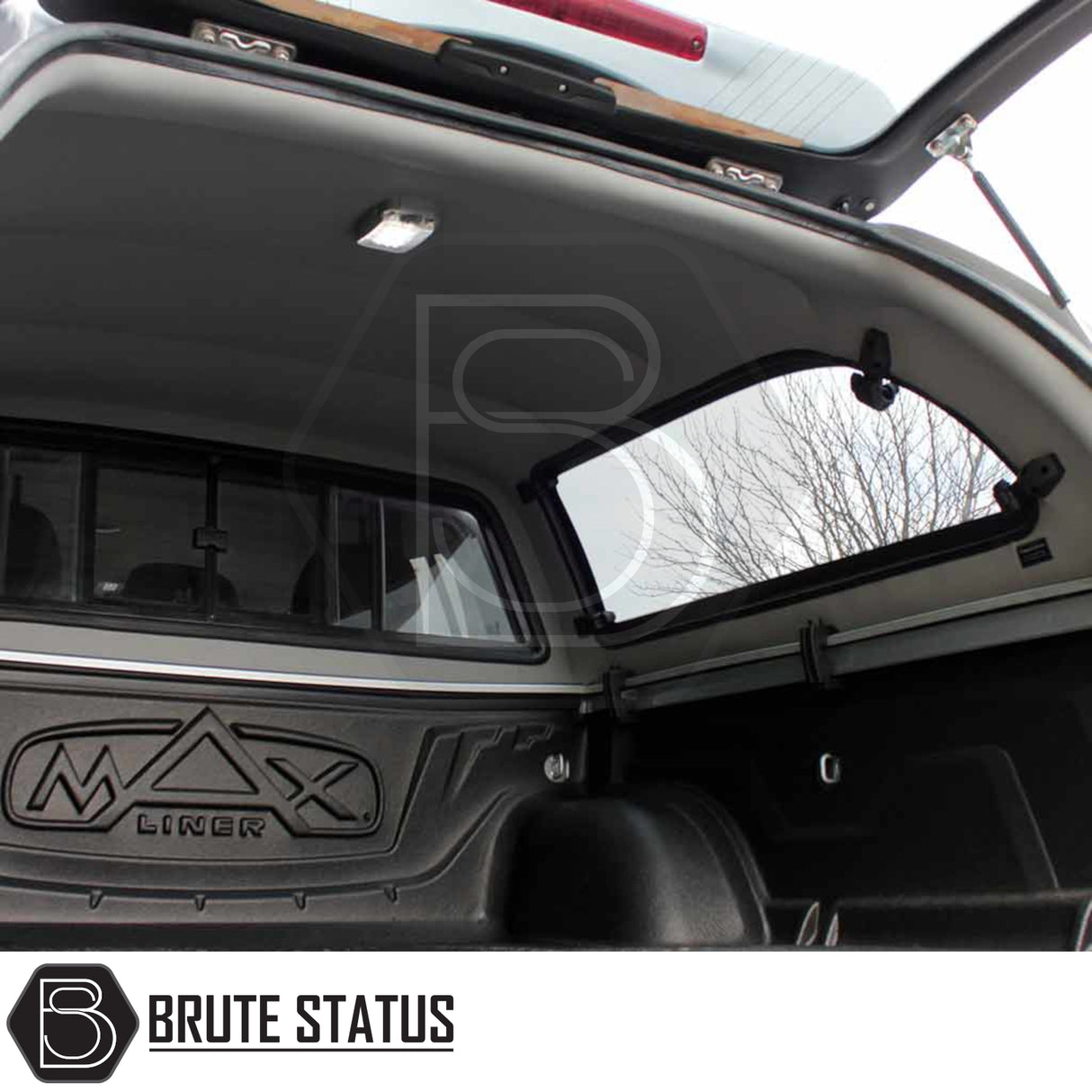 Mitsubishi L200 Series 4 Truckman Grand Hardtop Canopy with pop-out windows, remote locking, and MAX Liner bed protection shown in a pickup's cargo area.