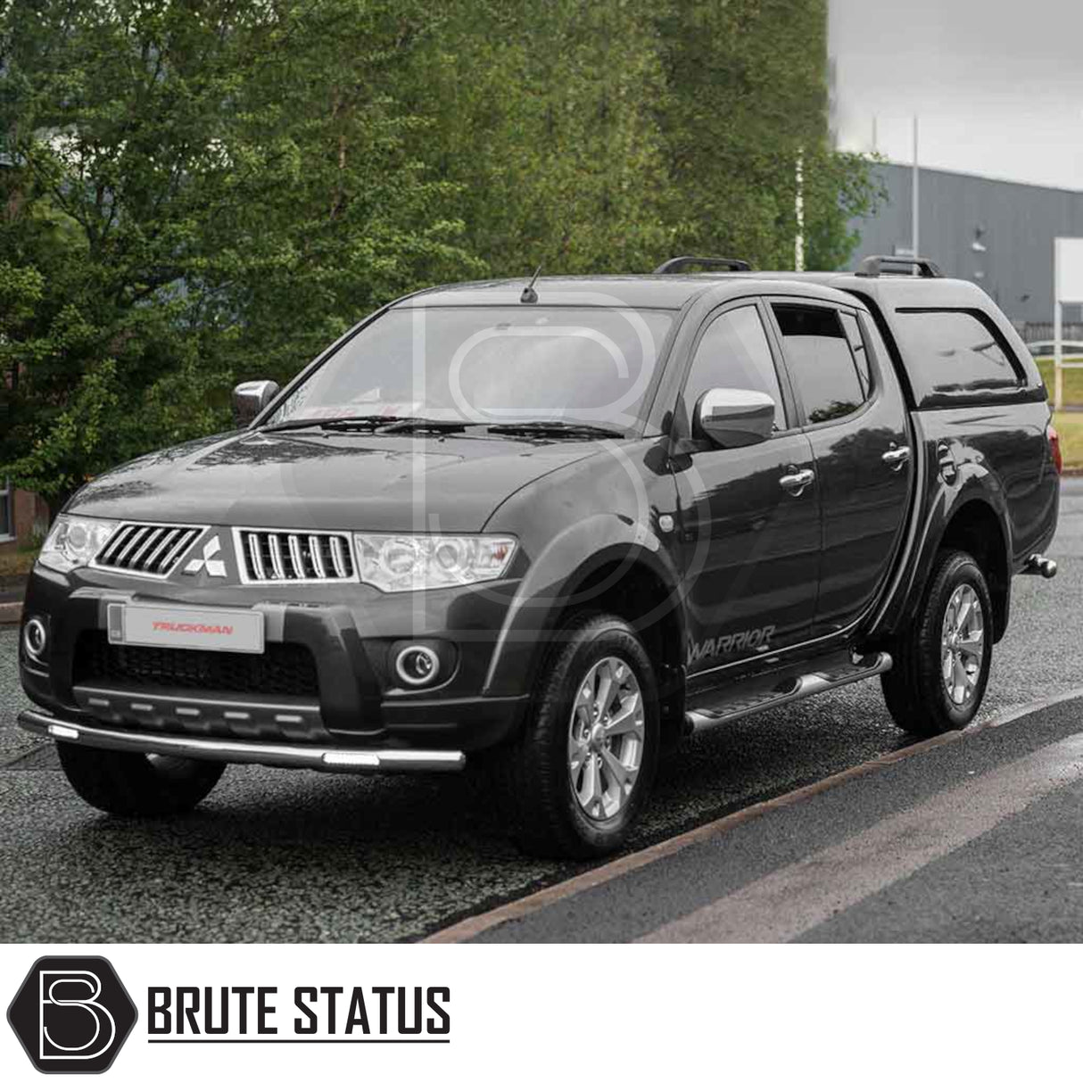 Mitsubishi L200 2010-2015 Long Bed Truckman L-Series Hardtop Canopy with remote locking, featuring a cab-high design, parked curbside with chrome side-steps.