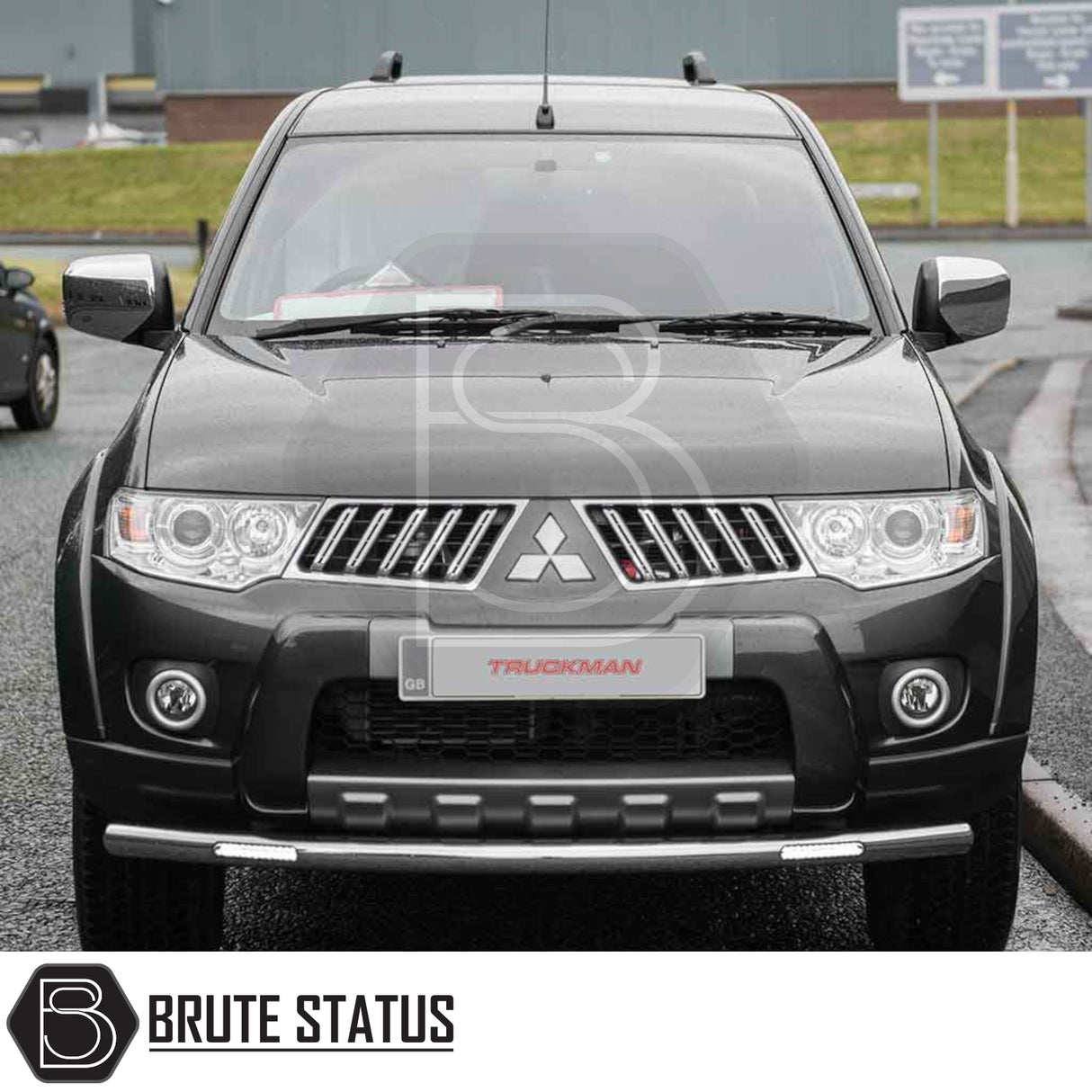 Mitsubishi L200 2010-2015 Series 4 with Truckman L-Series Hardtop Canopy, featuring a stainless nudge bar and LED lights, enhancing security and style.