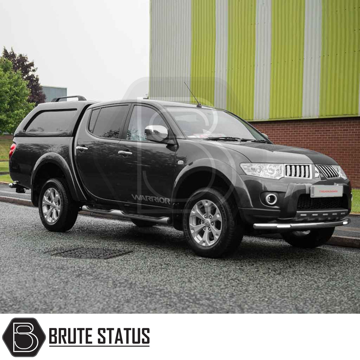 Mitsubishi L200 2010-2015 Series 4 Long Bed Truckman L-Series Hardtop Canopy with remote locking on dark-grey pickup, featuring tubular side-steps and front protection bars.