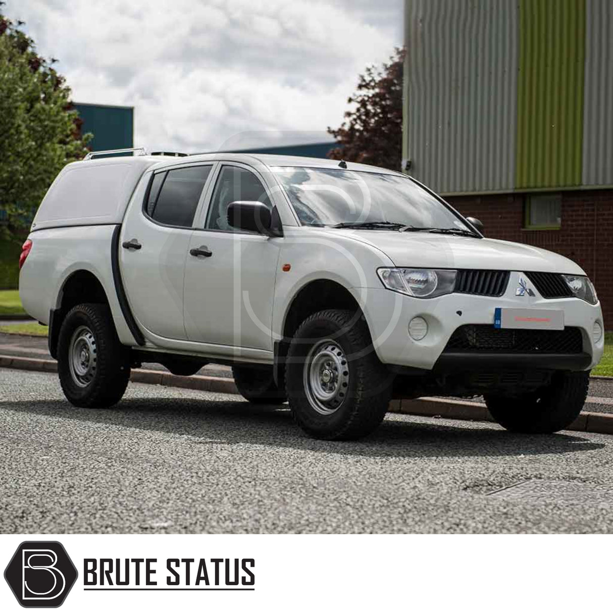Mitsubishi L200 2010-2015 Truckman RS Hardtop Canopy with glazed rear window, solid-sided, for enhanced security, fitted on a white double-cab pickup truck.