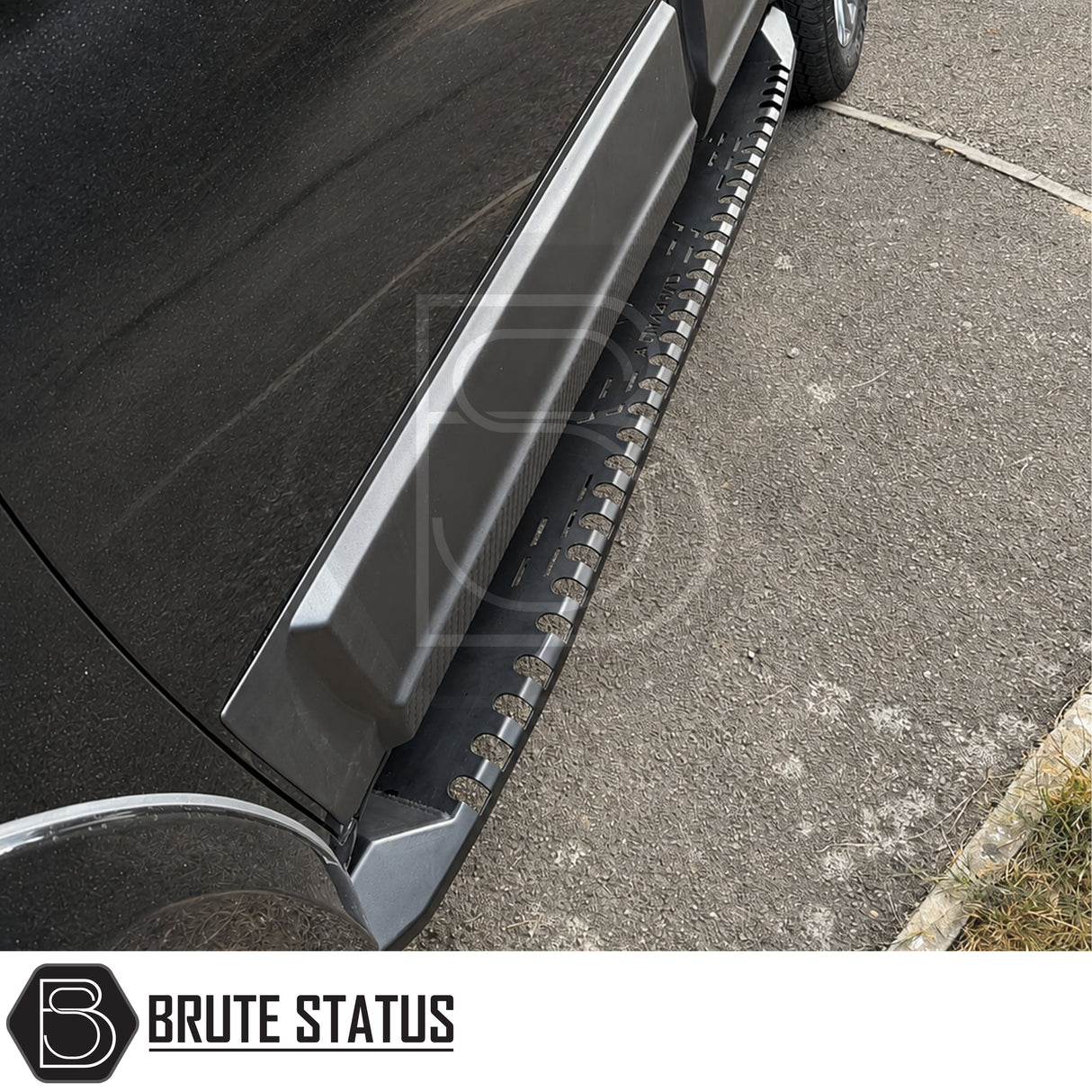 Mounted matte black heavy duty overlanding side steps fitted to Mitsubishi L200 pickup truck offroad 4x4 vehicle. Mounting hardware included.