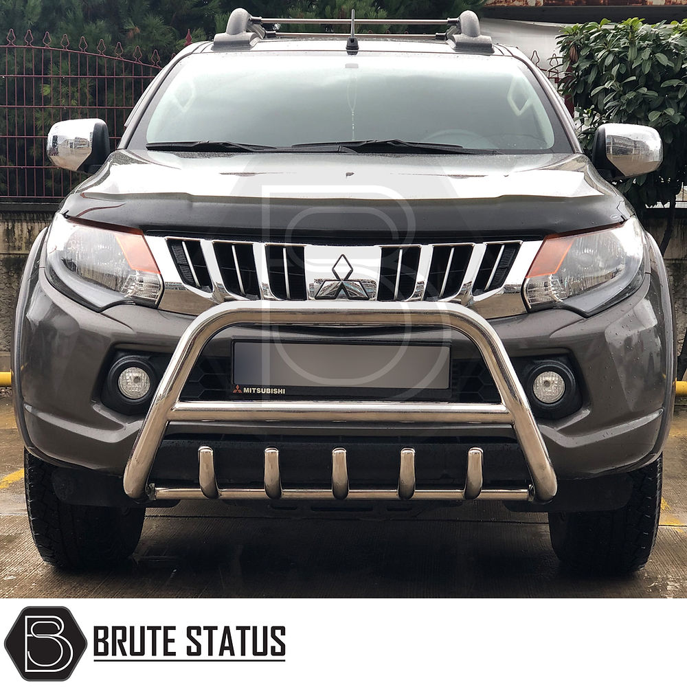 Mitsubishi L200 Series 5 2015-2019 A-Fitted Bar (Nudge Bar) Polished, enhancing bumper protection and style, visible on parked vehicle.