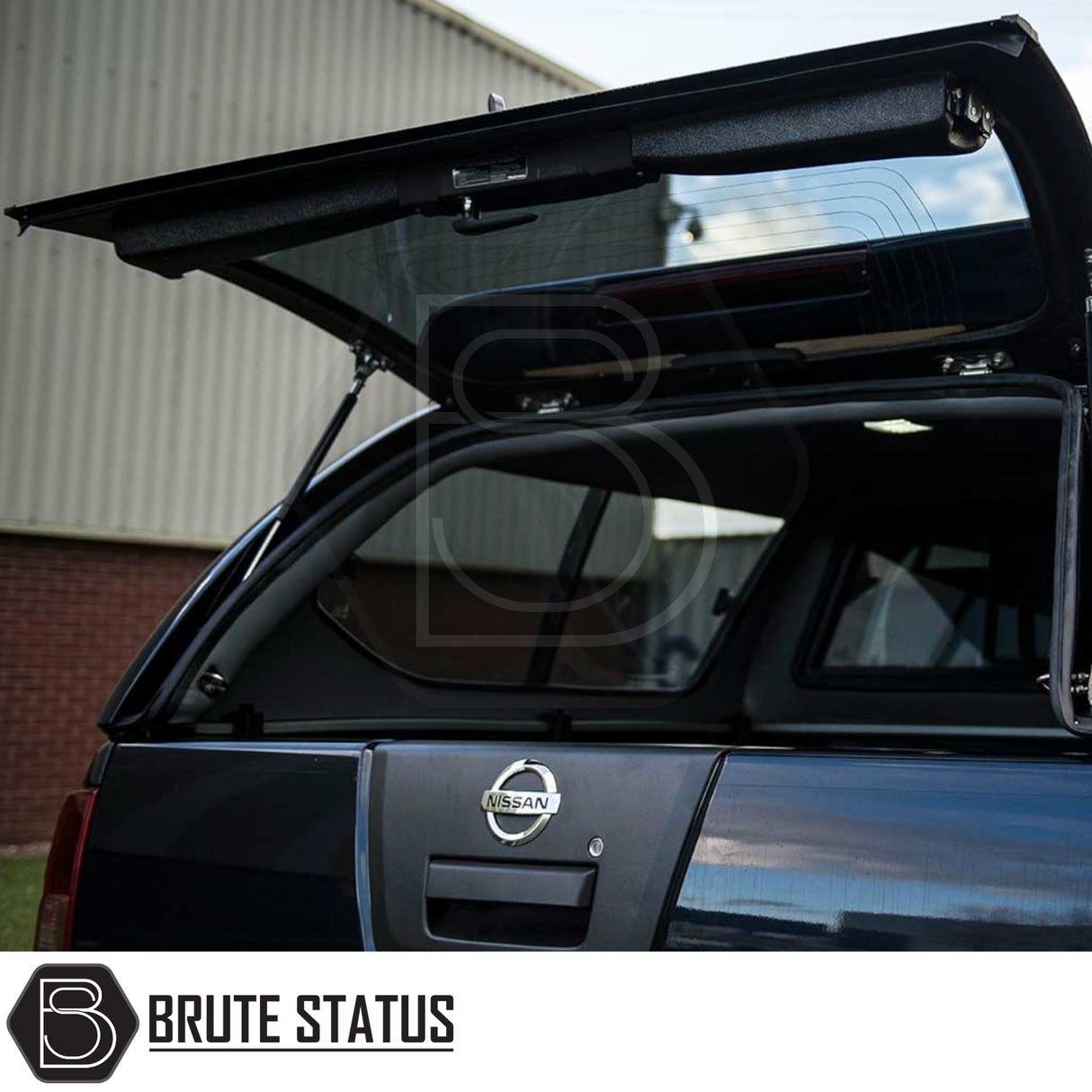 Nissan Navara 2005-2015 D40 Truckman GLS Hardtop Canopy with lifted rear glass, showcasing sliding windows and secure, remote locking features.