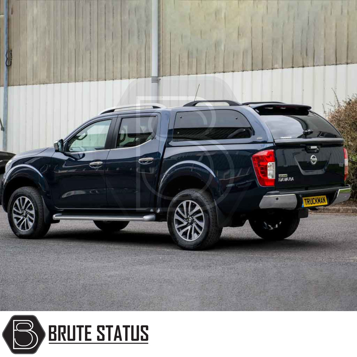 Nissan Navara 2005-2015 D40 Truckman Grand Hardtop Canopy with remote locking, featuring sleek design, tinted windows, and pop-out ventilation for enhanced utility and security.