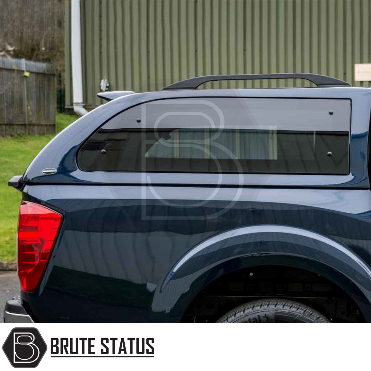 Nissan Navara D40 Truckman Grand Hardtop Canopy featuring tinted window, roof rails, and remote locking for enhanced security and style.