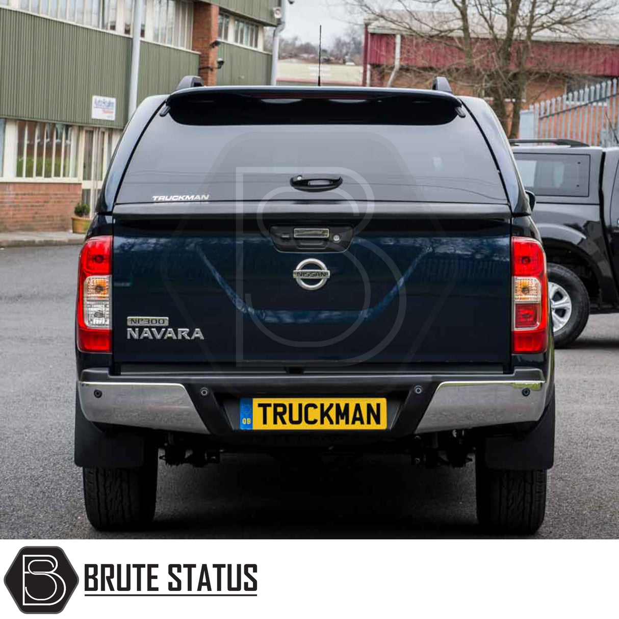 Nissan Navara 2005-2015 D40 fitted with Truckman Grand Hardtop Canopy showcasing remote locking and pop-out windows for enhanced security and style.