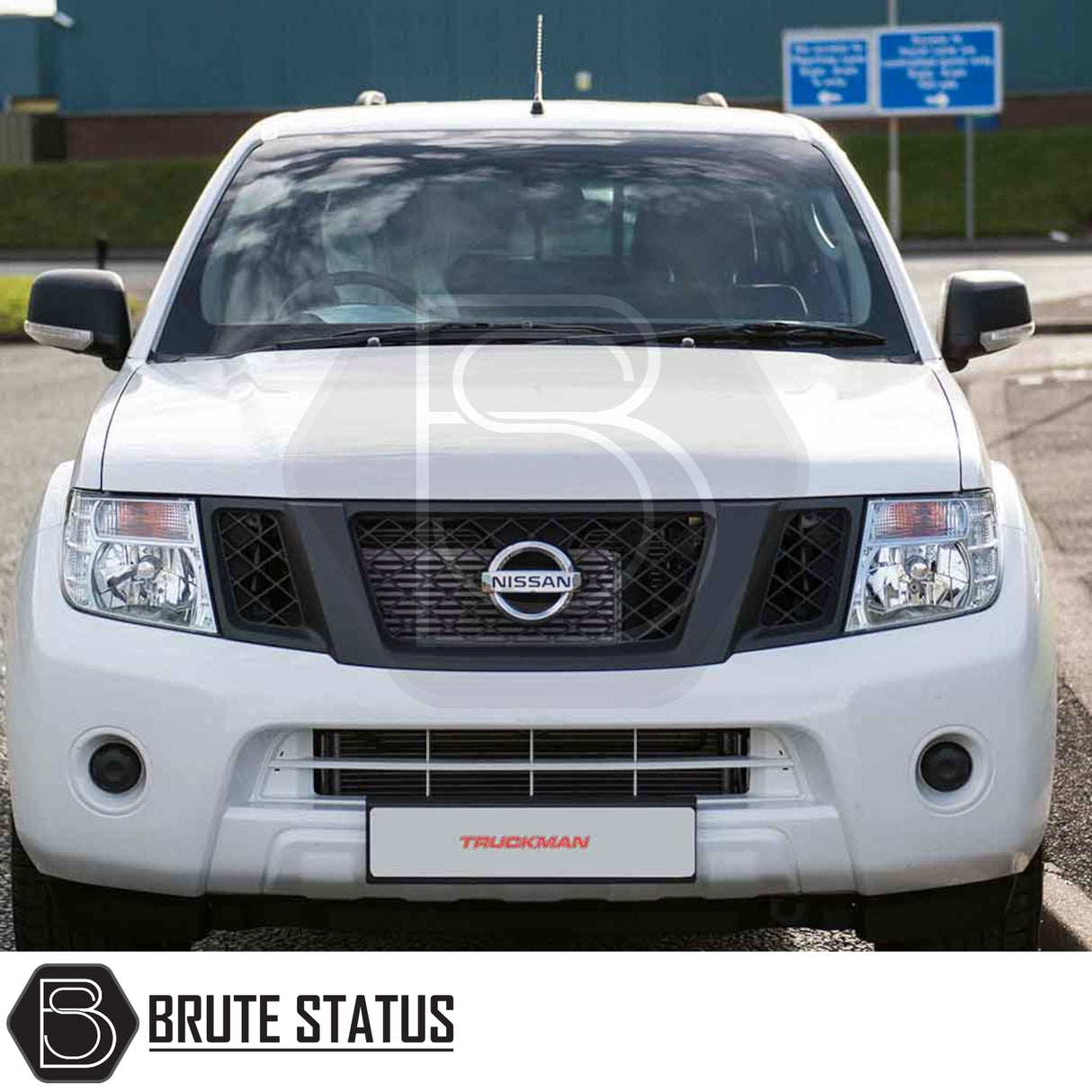 Front view of a white Nissan Navara with Truckman L-Series Hardtop Canopy, showcasing enhanced security and sleek design, ideal for increased storage and convenience.