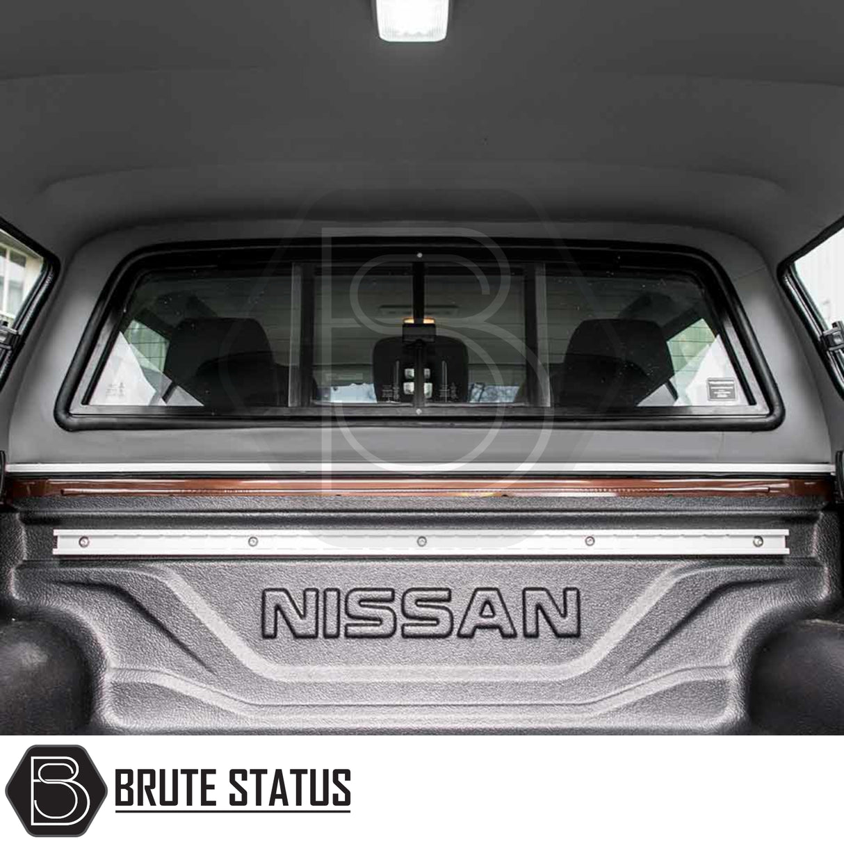 Nissan Navara 2015-2023 NP300 Truckman GLS Hardtop Canopy with remote locking, showing bed liner, tie-down rail, sliding window, interior dome light, and Brute Status branding.