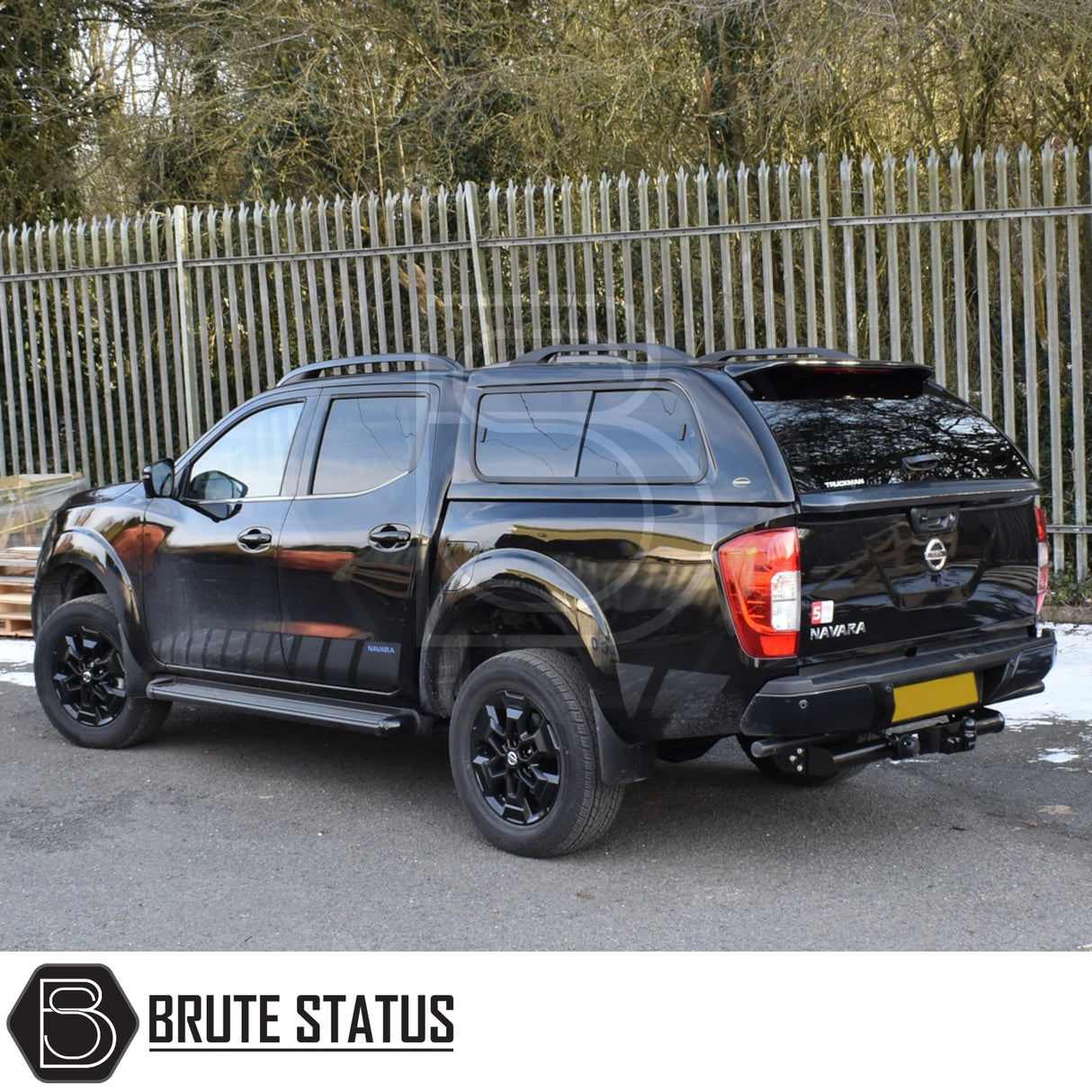 Nissan Navara with Truckman GLS canopy featuring tinted windows, remote locking, and vinyl-lined interior, enhancing vehicle storage and style.