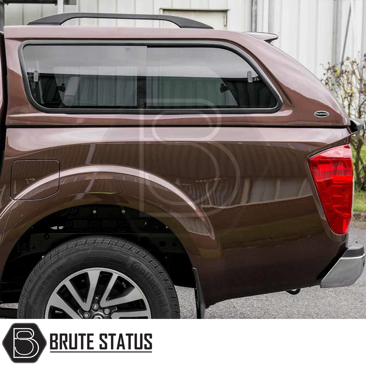 Nissan Navara NP300 Truckman GLS Hardtop Canopy with tinted windows, roof rails, and remote locking, enhancing security and style for pickup truck customization.