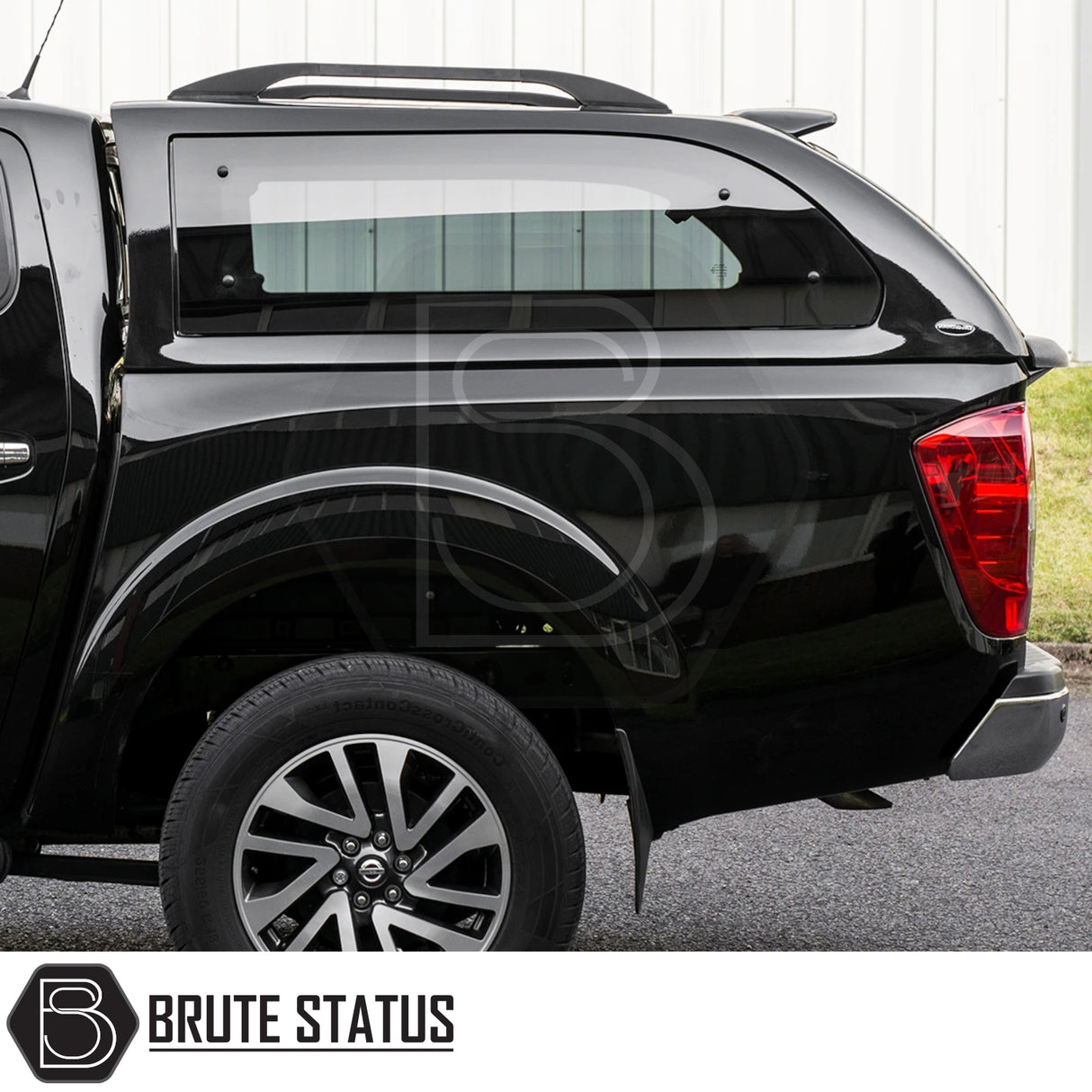 Nissan Navara 2015-2023 NP300 Truckman Grand Hardtop Canopy with remote locking, featuring tinted windows, roof rails, and Brute Status branding, enhancing functionality and security.