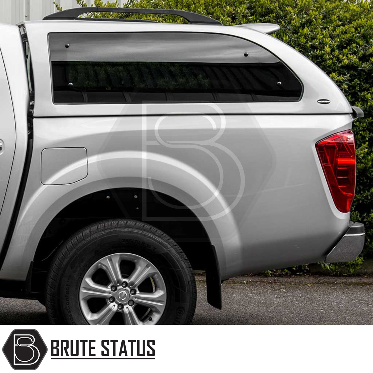 Nissan Navara 2015-2023 NP300 Truckman Grand Hardtop Canopy with remote locking, shown with a sleek design, tinted window, and Brute Status branding.