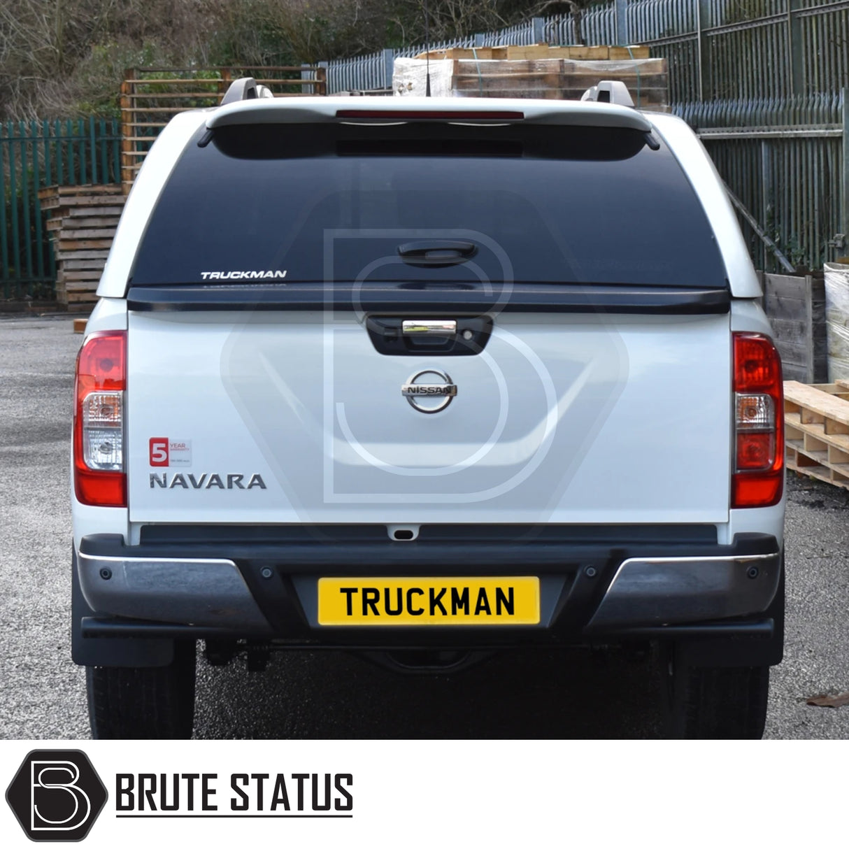 Nissan Navara 2015-2023 NP300 Truckman Grand Hardtop Canopy with remote locking, shown on a white pickup, featuring tinted windows and aerodynamic design.