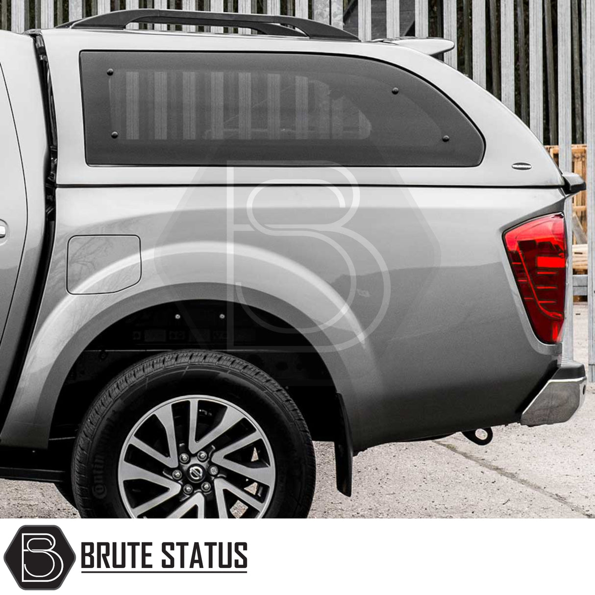 Nissan Navara Truckman Grand Hardtop Canopy with tinted windows and remote locking, enhancing cargo security and style for pickup truck customization.