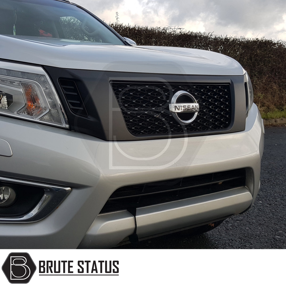 Nissan Navara NP300 2015-2022 Nismo style front grille in matte black, premium ABS replacement grille with aggressive aftermarket pickup truck styling.