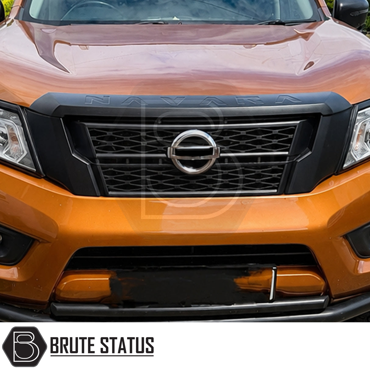 Front mounted heavy duty matte black coated grille fitted to Orange Nissan Navara NP300 pickup truck offroad 4x4 vehicle. Easy and straightforward installation.