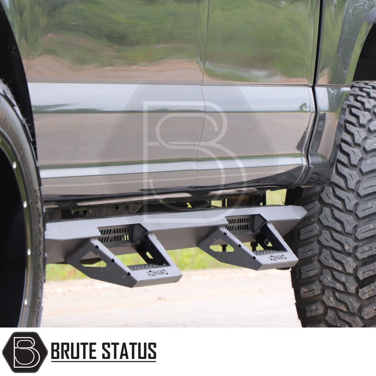 Mercedes X-Class 2017-2020 Heavy Duty T32 Steel Side Steps on a lifted truck, showcasing oversized off-road tires and aftermarket steel side step/rock slider.