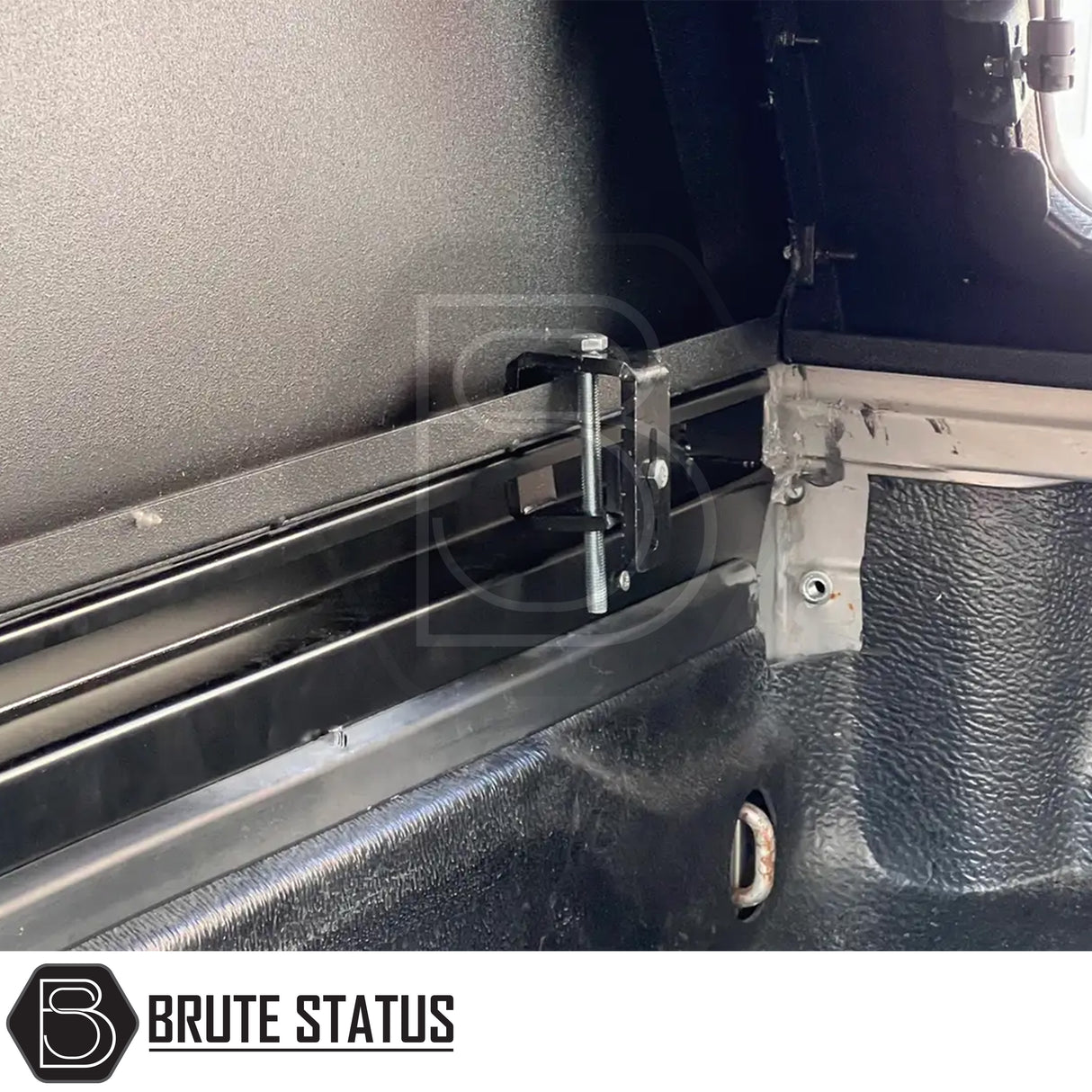 Heavy-duty steel rear canopy with Line-X coating, multi-access doors, and roof rails for Isuzu D-Max 2012-2021 pickup truck