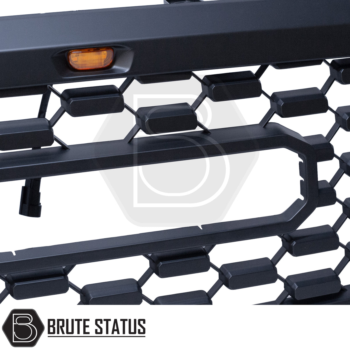 Matte black aftermarket grille with three bright amber LED lights, designed for Toyota Hilux 2005–2011 (MK6). Made from durable ABS plastic with a smooth black finish, it fits using existing mounting points with no drilling require