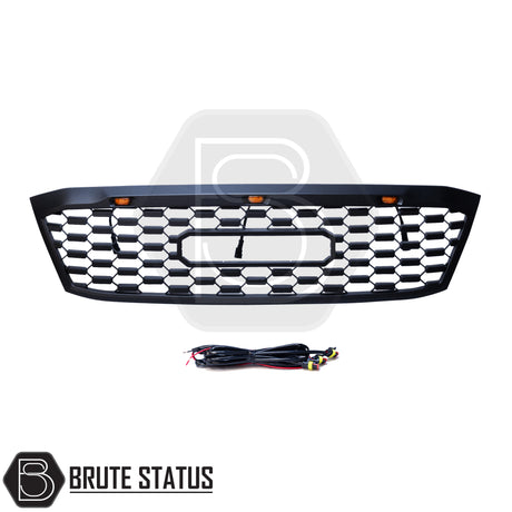 Matte black aftermarket grille with three bright amber LED lights, designed for Toyota Hilux 2005–2011 (MK6). Made from durable ABS plastic with a smooth black finish, it fits using existing mounting points with no drilling require
