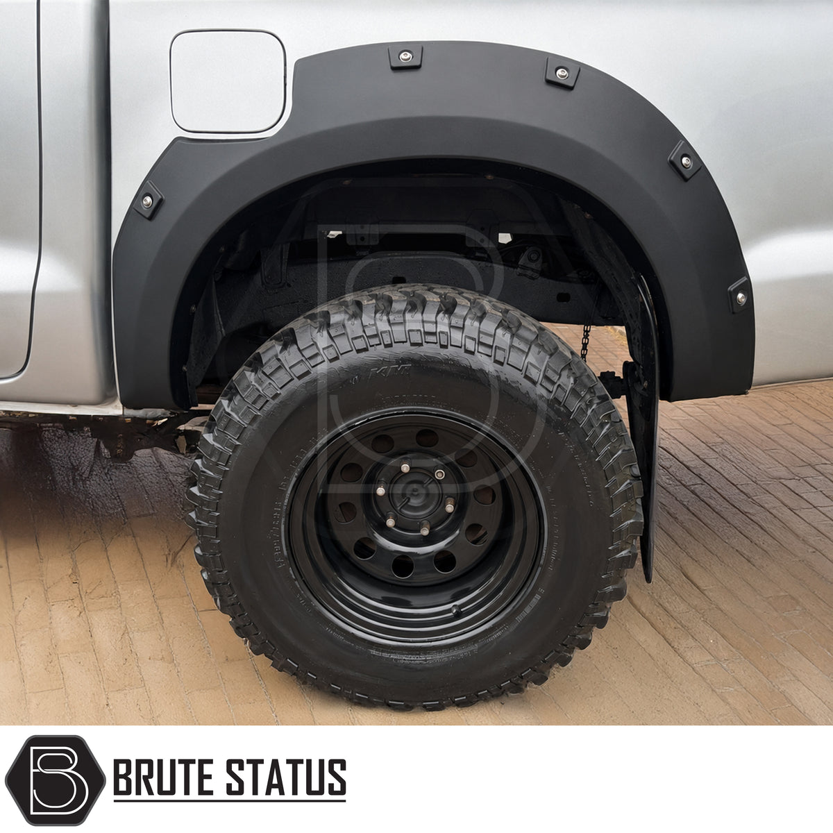 Toyota Hilux 2005-2011 pre-facelift Double Cab wide wheel arch kit with riveted style black fender flares adding approximately 65-70mm width per side