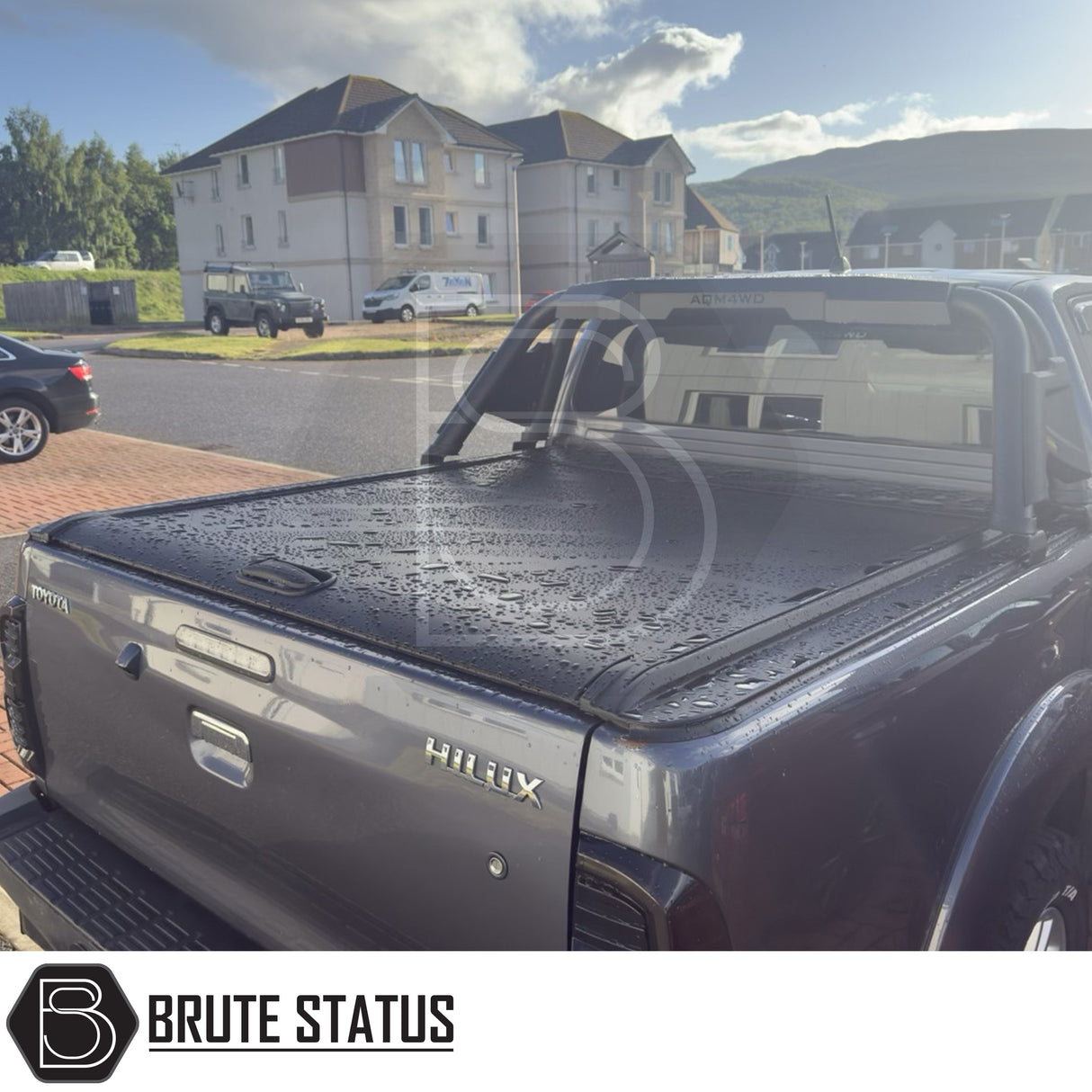 Black manual roller shutter for toyota hilux 2005-2014 pickup truck. Durable, high-quality design for secure cargo protection and easy manual operation