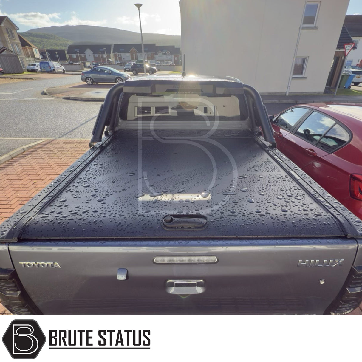 Black manual roller shutter for toyota hilux 2005-2014 pickup truck. Durable, high-quality design for secure cargo protection and easy manual operation