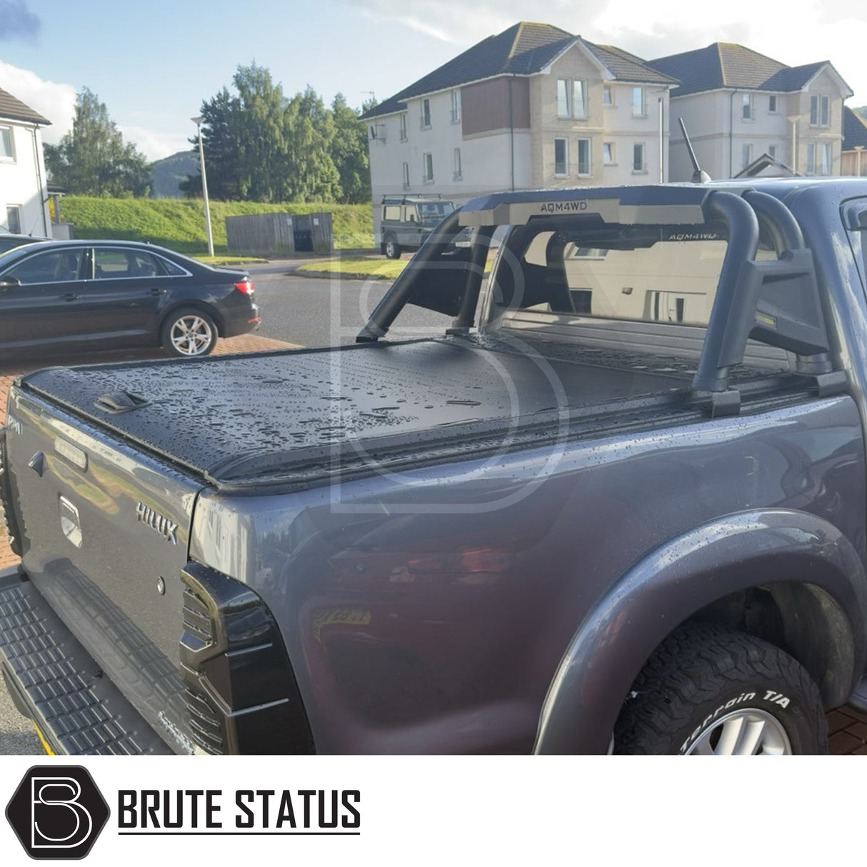 Black manual roller shutter for toyota hilux 2005-2014 pickup truck. Durable, high-quality design for secure cargo protection and easy manual operation