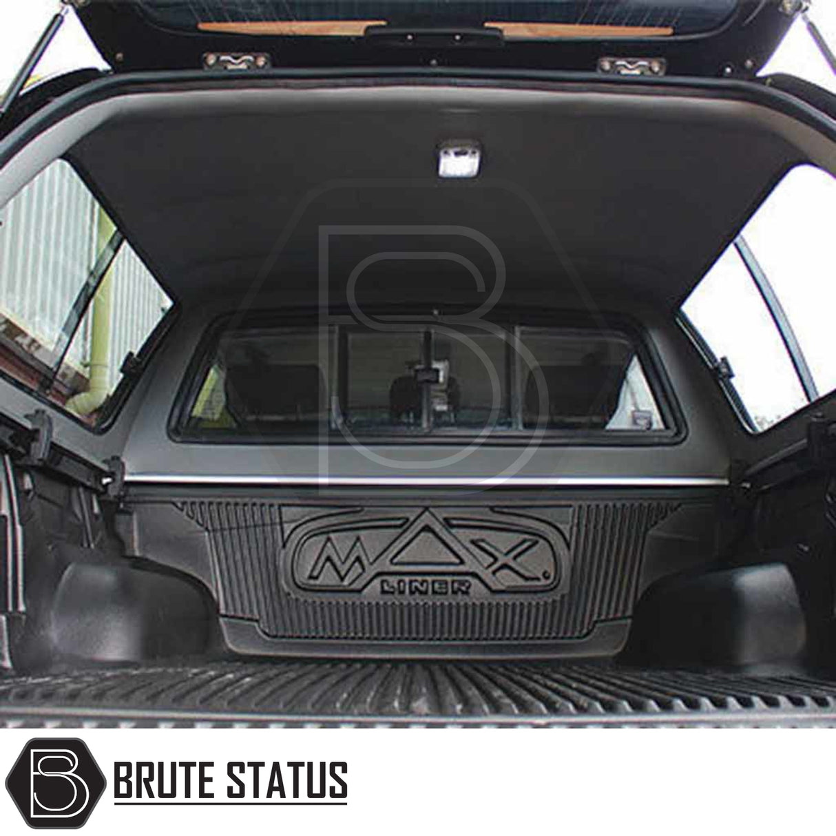 Toyota Hilux 2005-2016 MK6, MK7 Truckman GLS Hardtop Canopy with remote locking, shown installed with MAX LINER in truck bed, viewed from open tailgate.