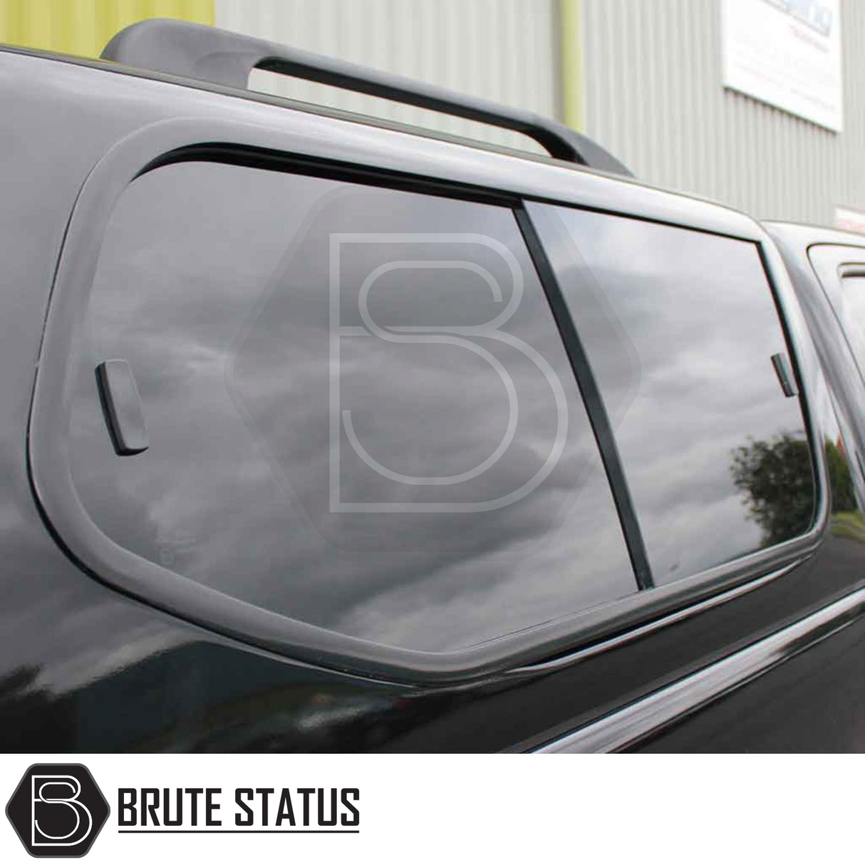 Toyota Hilux 2005-2016 Truckman GLS Hardtop Canopy with tinted sliding windows and roof rails, featuring sporty design and secure, remote locking.