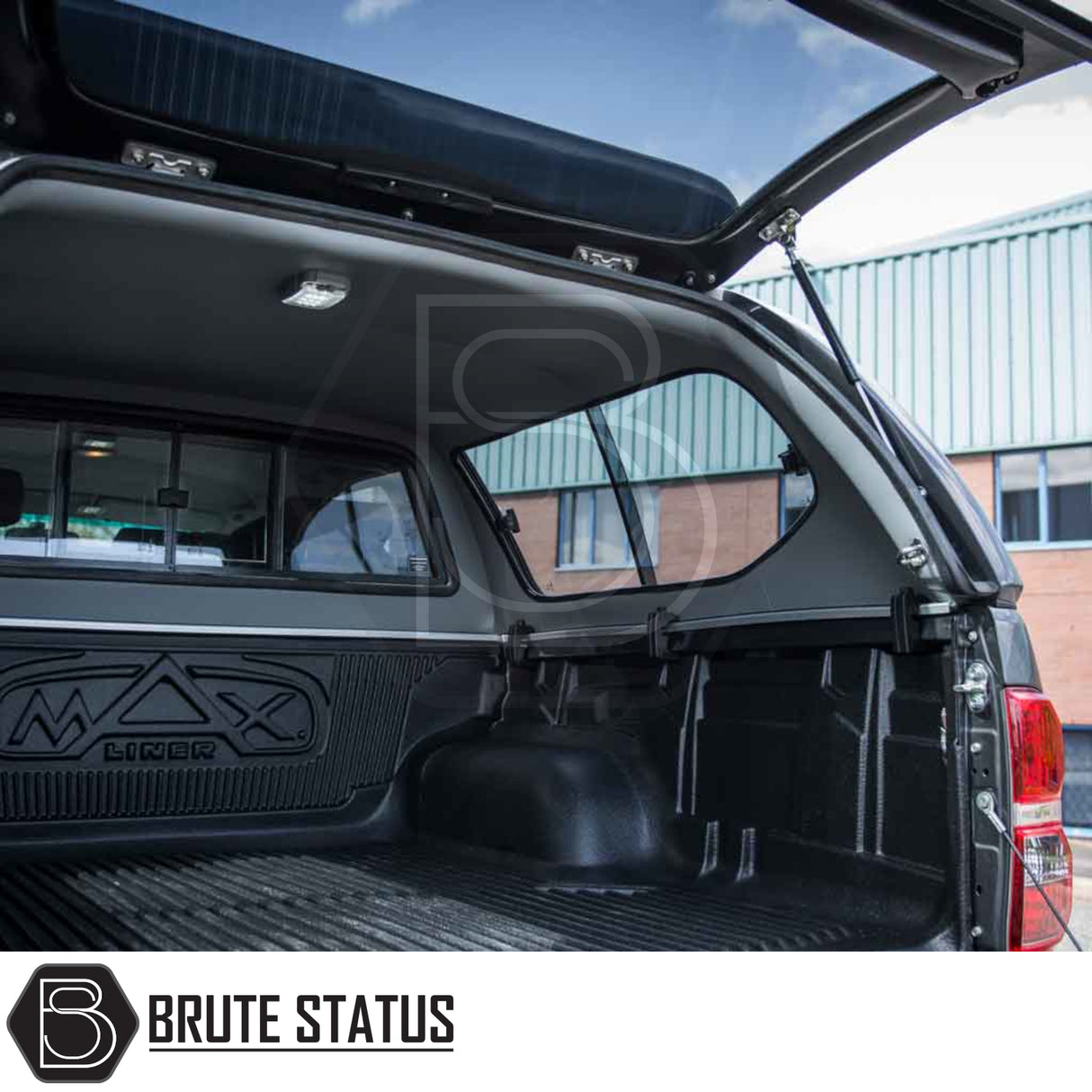 Toyota Hilux 2005-2016 MK6, MK7 Truckman GLS Hardtop Canopy with remote locking and MAX Liner bed, showcasing open hatch supported by gas struts.